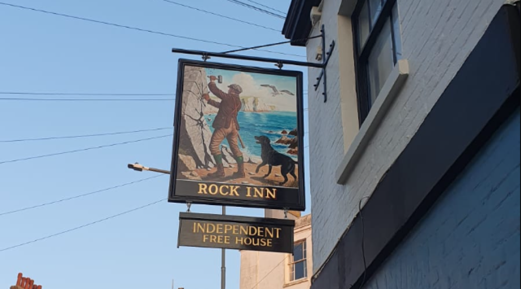 A pub sign outside The Rock Inn, Brighton
