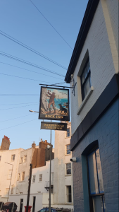 A pub sign outside The Rock Inn, Brighton